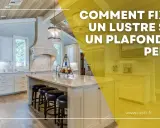 Comment fixer un lustre sur un plafond en pente : une cuisine moderne avec îlot central et luminaires suspendus.