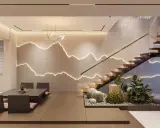 Intérieur moderne avec escalier en bois, éclairage mural en forme de montagnes et mobilier épuré.