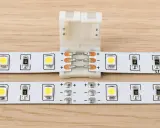 Connecteur pour montrer comment brancher plusieurs LED ensemble. Des bandes LED blanches avec des composants électroniques sont visibles.