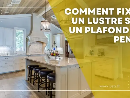 Comment fixer un lustre sur un plafond en pente : une cuisine moderne avec îlot central et luminaires suspendus.