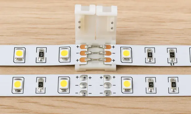 Connecteur pour montrer comment brancher plusieurs LED ensemble. Des bandes LED blanches avec des composants électroniques sont visibles.